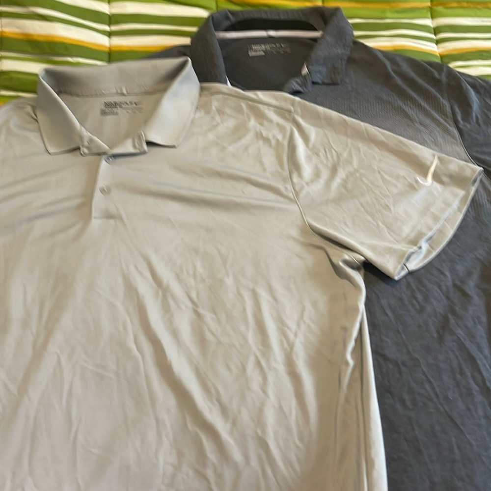 Two  Nike Golf shirts